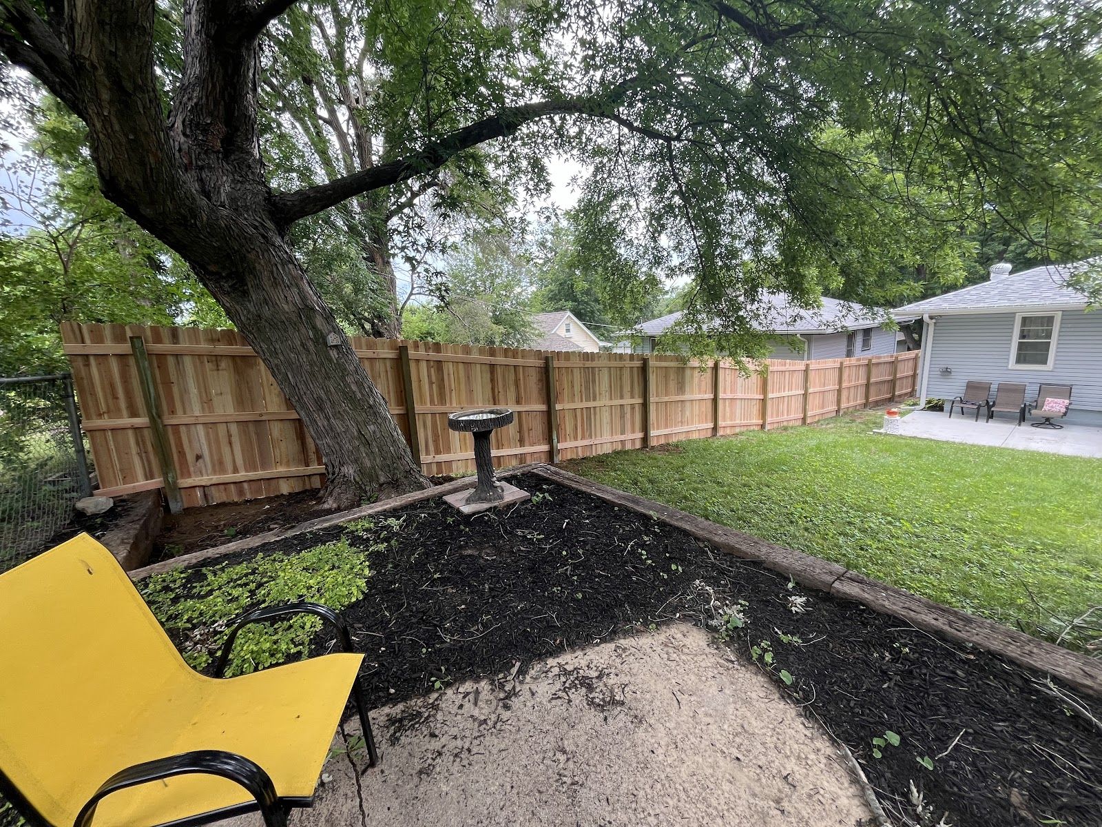 Cedar privacy fence with a matched gate