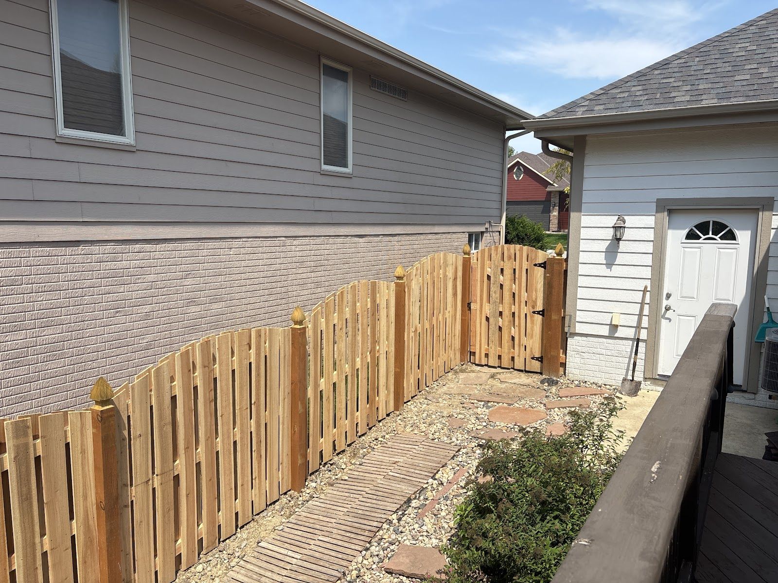 Scalloped cedar shadowbox fence